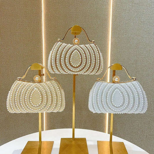 Borsa a mano da donna con diamanti e perle