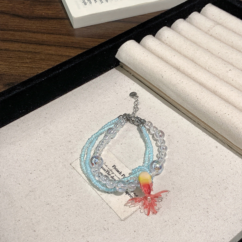 Collana di perline vintage con pesce rosso