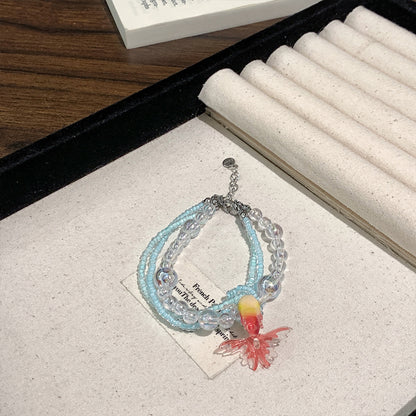 Collana di perline vintage con pesce rosso