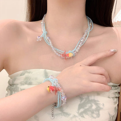 Collana di perline vintage con pesce rosso